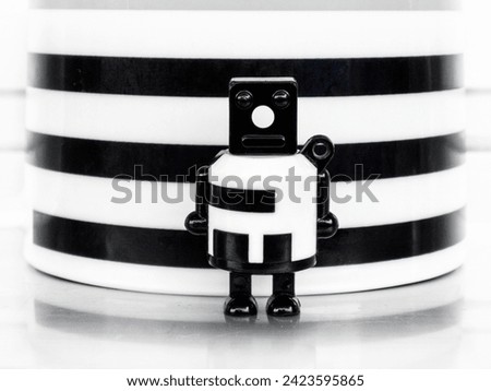 Plastic black and white robot macro lanscape