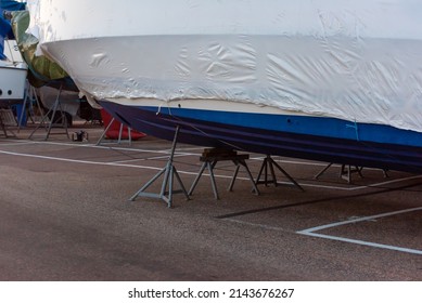 Plastic Boat With Blue Hull Paint.