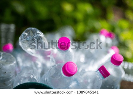 Plastic bottle in the basket for recycling