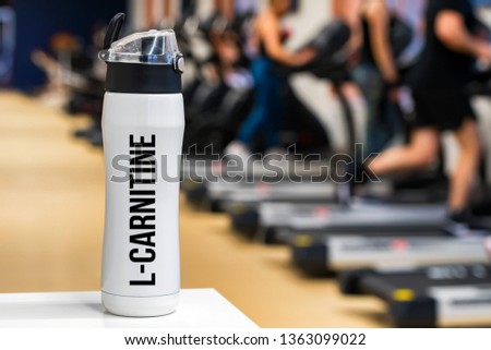 Plastic bottle or cup with L-Carnitine drink close up Photo stock © 