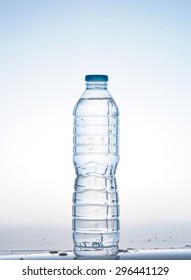 Plastic bottle of drinking water isolated on white background