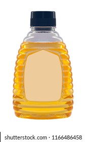 Plastic bottle with honey isolated on a white background