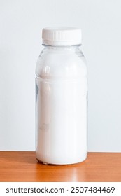 Plastic bottle with a sample of white substance.