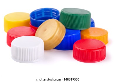 Plastic bottle screw caps isolated on white - Powered by Shutterstock