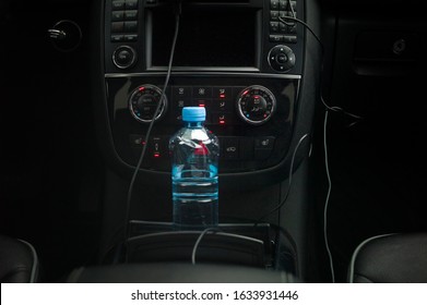 Plastic Bottle Of Still Water In A Car Cup Holder 