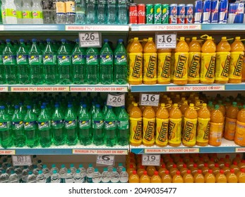 Plastic Bottles Of Carbonated Soft Drinks Kept Together On The Shelf Of A Supermarket At Pune, India On 30 August 2021