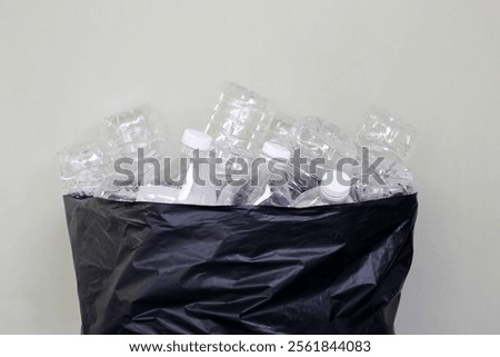 Plastic bottles in garbage bag