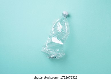 Plastic bottles on blue background. top view. Recycle plastic, waste pollution concept. Top view, copy space. Environmental protection concept. Reuse garbage, plastic free. Earth, world water day.