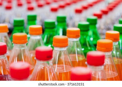 Plastic Bottles With Soft Drinks Background