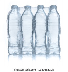 Plastic Bottles Water In Wrapped Package On White Background