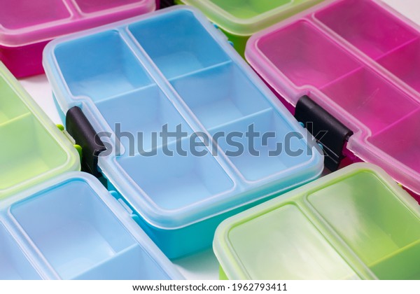 Plastic box with\
compartments for small