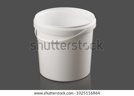 plastic bucket on a gray background