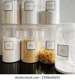 Plastic Canister On Kitchen Counter With Labels