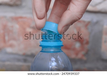 Plastic cap attached to a bottle in macro close-up