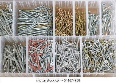 Plastic case with different screws.