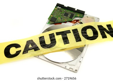 plastic caution tape and harddisk, computer crime