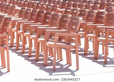 Plastic chairs in the concert hall. - Shutterstock ID 2363643217