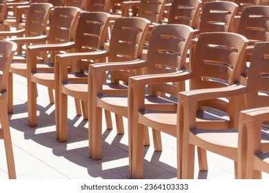 Plastic chairs in the concert hall. - Shutterstock ID 2364103333