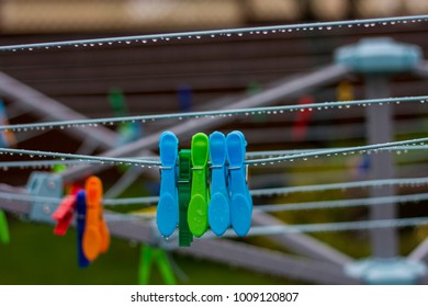 plastic clothes peg in the rain