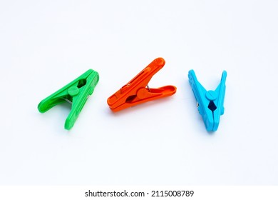 Plastic clothespin on white background.