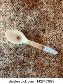 Plastic  Coffee Spoon On The Table