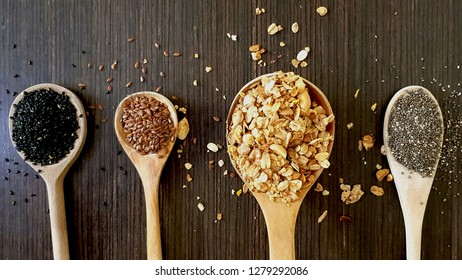 Plastic composition with different types of grains and grains on a brown background.