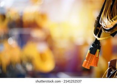 Plastic connector of wiring harnesses. Industrial background with copy space. Automobile industry theme.