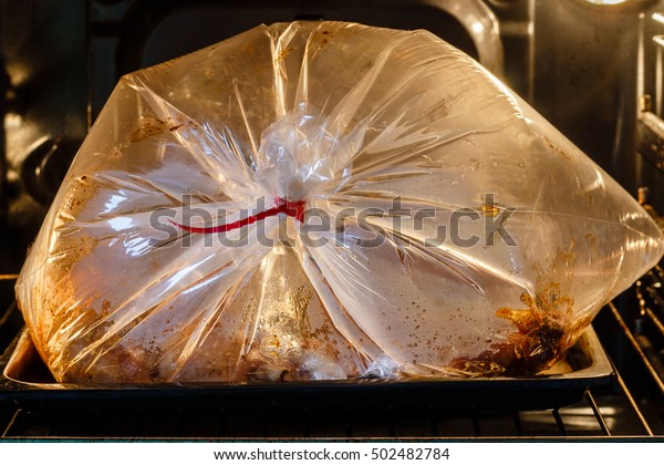 plastic wrap in oven
