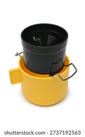 Plastic cup with drip coffee filter on white background