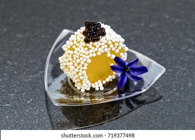 Canapé In Plastic Cups On A Stone Background