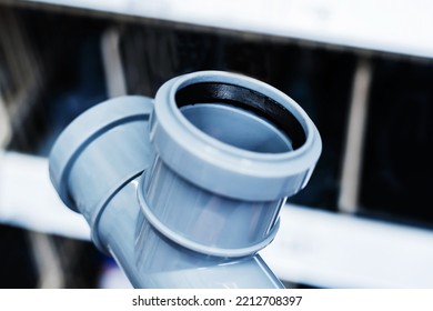 Plastic Detail Of A Sewer Pipe With A Rubber Gasket. The Choice Of Material And Components For The Installation Of The Sewer System. Close-up. Selective Focus