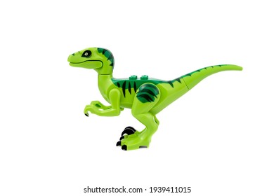 Plastic dinosaur toy isolated on white background.