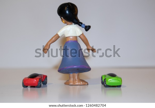 plastic doll with little
machine