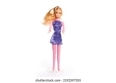 Plastic doll toy isolated on white background. High quality photo