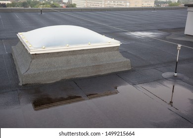 Plastic Dome On A Flat Roof On A Large Building In The Heart Of The City