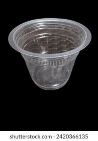 Plastic drinking water cup with black background