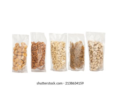 Plastic Dry Fruit Standup Pouch On Isolated White Background. Different Types Of Nuts In Packages On White Background