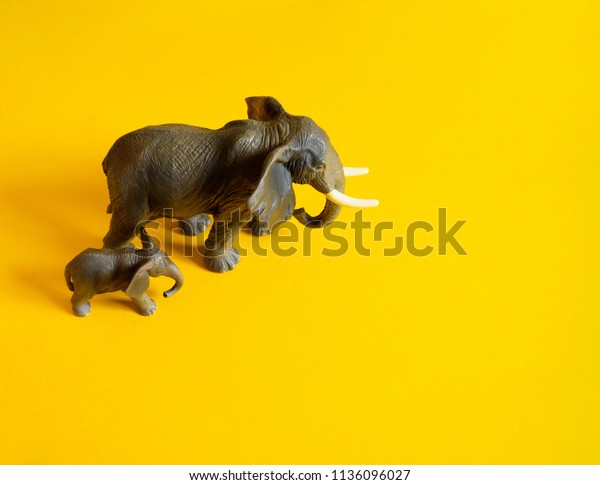 small plastic toy elephants