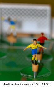 Plastic figurines on a spring from the table football game.