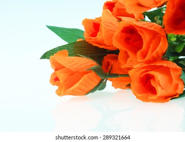 Plastic Flowers On A White Background