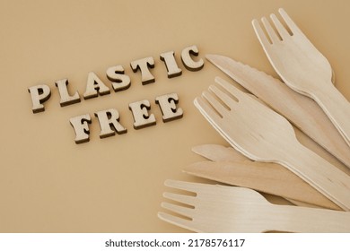 PLASTIC FREE Text Around Eco Friendly, Disposable, Recyclable, Compostable Tableware. Paper Food Boxes, Dishes On Neutral Beige Background. Sustainable Lifestyle Concept. Flat Lay Earth Tones