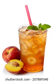 Plastic glass of peach ice tea isolated on white background