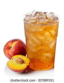 Plastic glass of peach ice tea isolated on white background