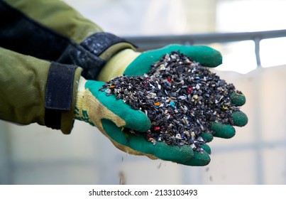 Plastic granulate in a plastic waste recycling plant - Shutterstock ID 2133103493