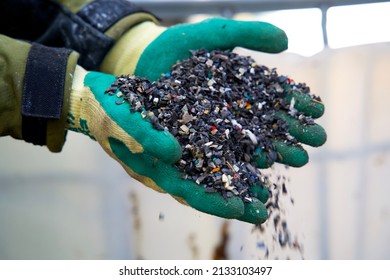 Plastic granulate in a plastic waste recycling plant - Shutterstock ID 2133103497