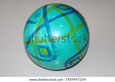 plastic green ball on white background