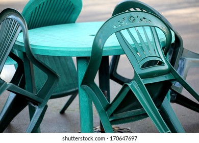 Plastic Green Table And Chairs At An Outside Diner.