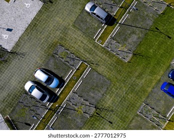 Plastic Grid Systems system made from recycled plastics that reinforce  ground for parking walkways.Stormwater Management permeable, allowing rainwater to soak into ground rather running off into sewers,  prevent flooding.  heavy loads, making them ideal for green parking lots, driveways, high-traffic pedestrian paths.