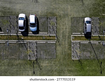 Plastic Grid Systems system made from recycled plastics that reinforce  ground for parking walkways.Stormwater Management permeable, allowing rainwater to soak into ground rather running off into sewers,  prevent flooding.  heavy loads, making them ideal for green parking lots, driveways, high-traffic pedestrian paths.