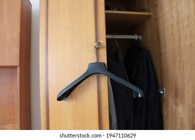 Plastic Hanger On Closet Door